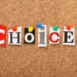 bulleting board with the word "choices" pinned